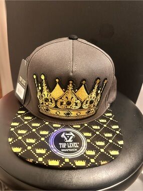 Top Level Snapback Hat with Gold Crown Design